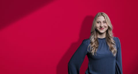 STOCKMEIER employee STOCKMEIER employee in front of red background