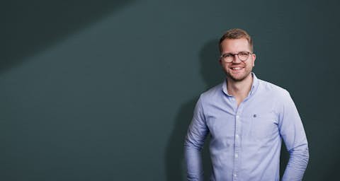 STOCKMEIER employee STOCKMEIER employee in front of grey background