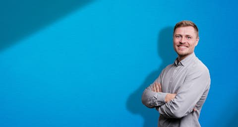 STOCKMEIER employee STOCKMEIER employee in front of blue background
