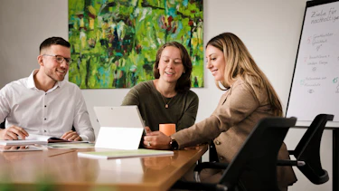 Team secondary raw materials Three employees discussing sustainability