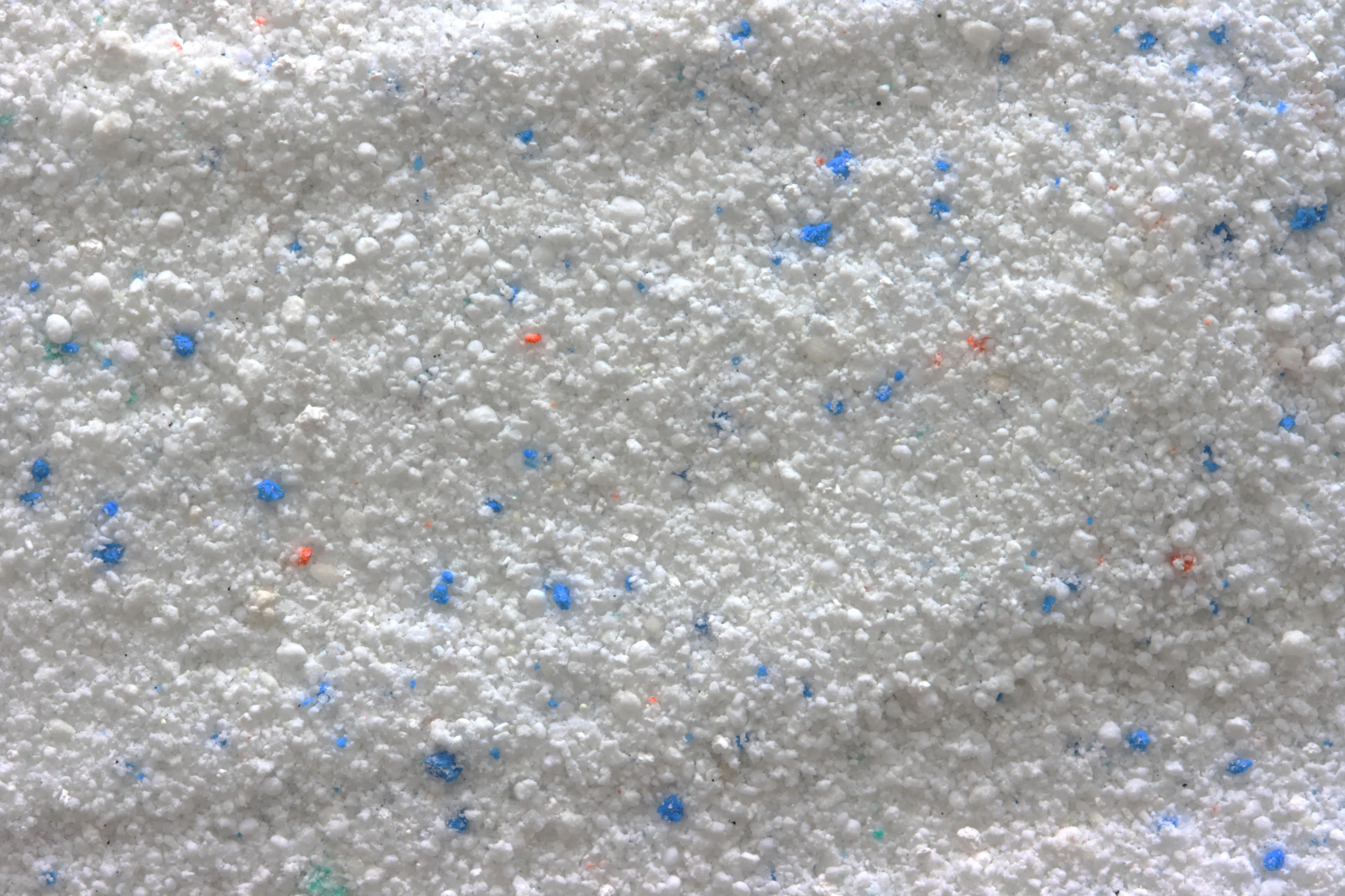 Powder grains Powder granis with ink pigments