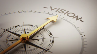 Kompass mit Zeiger in Richtung "Vision" Kompass mit Zeiger in Richtung "Vision"