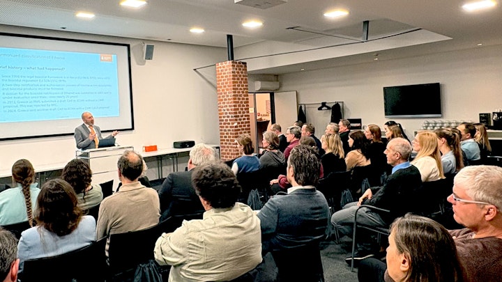 Audience members at Personal Care Day listen to Dr Michael Wilz's presentation.