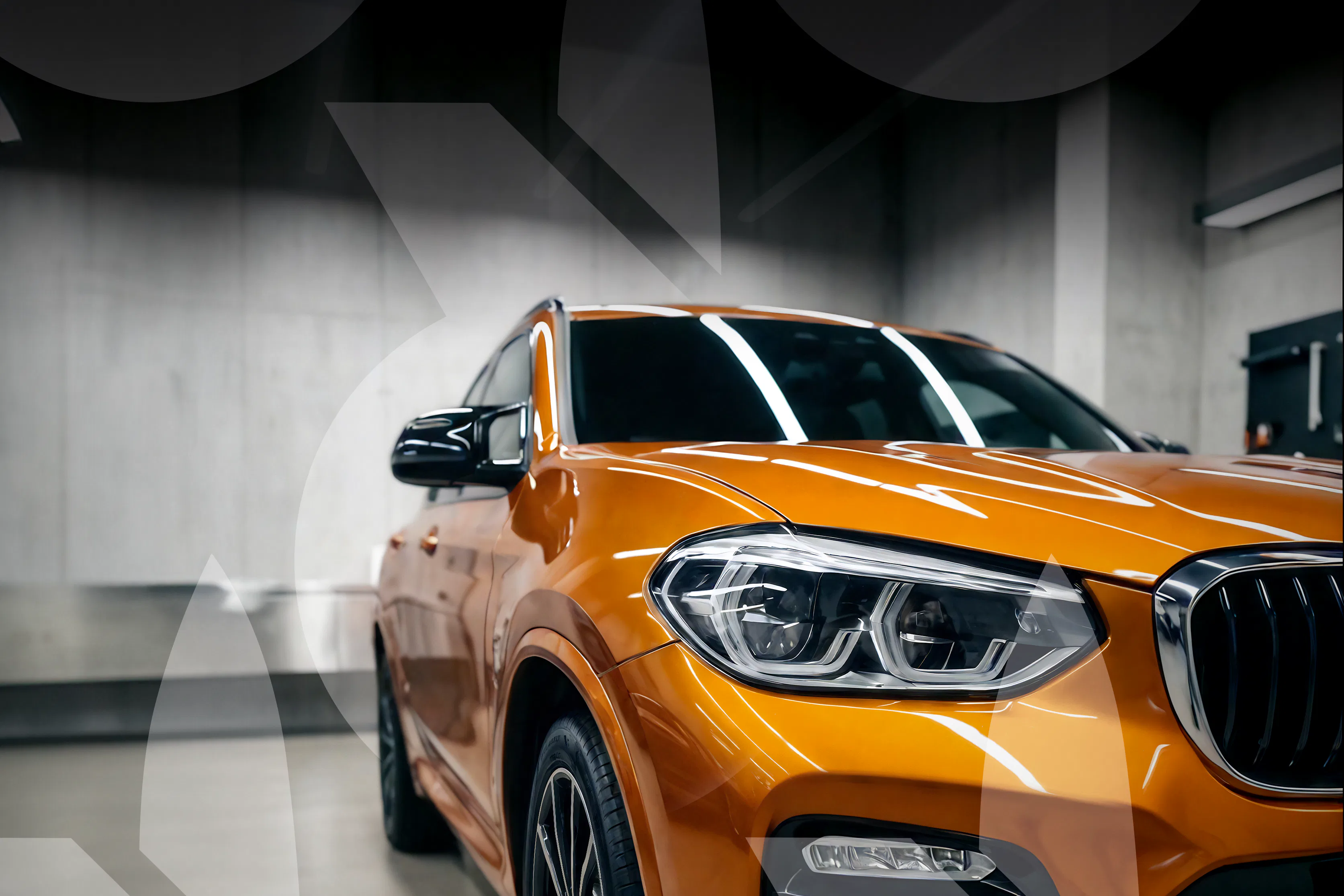 GlossTec® Ceramic Line Shiny orange car in ront of grey background