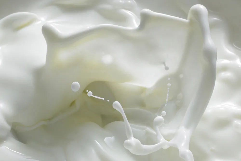 Weißes Flüssigkeit Kalkmilch Spritzer