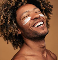 man with lotion on his face