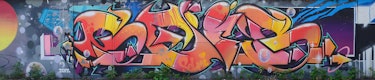 Graffiti street art on a wide wall Graffiti street art on a wide wall