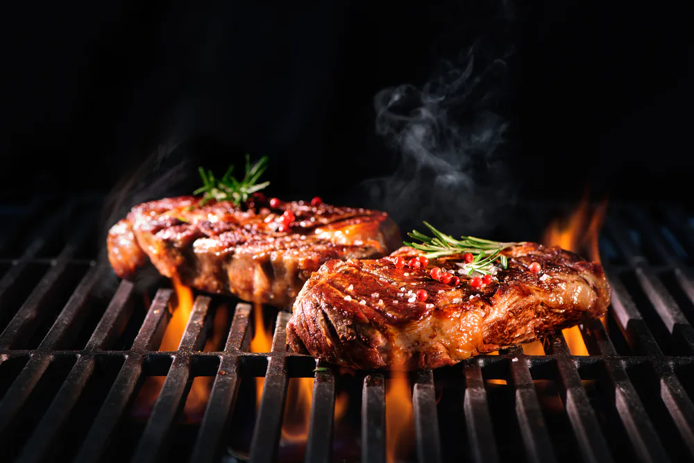 Steaks on grill Steaks on grill