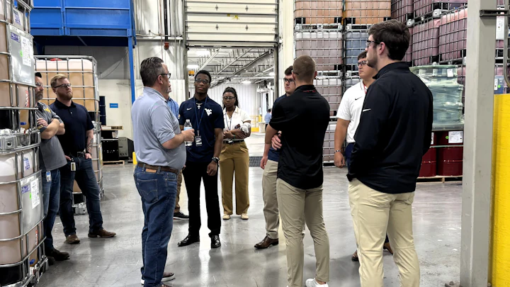 Chris Martinkat speaking with the Chambers Elite Climbers on a tour of the STOCKMEIER Urethanes USA facility