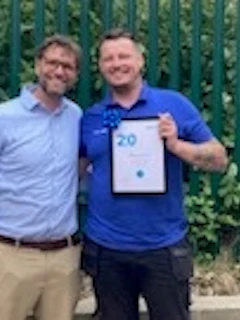 CTO Tim Blundell gratulate Danny for 20 years of working together