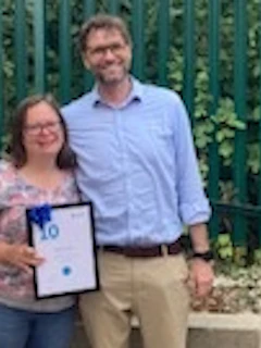 CTO Tim Blundell and Rebeccas with a gratulation to years of working together