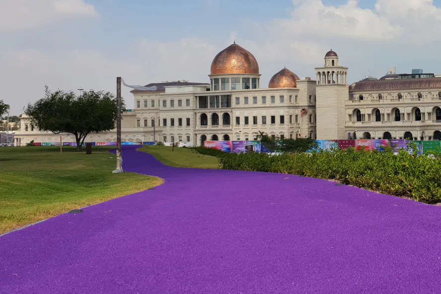 Rubberized walking and running path at Katara Hills in Doha, Qatar Katara Hills in Doha, Qatar with a rubberized purple jogging and running path